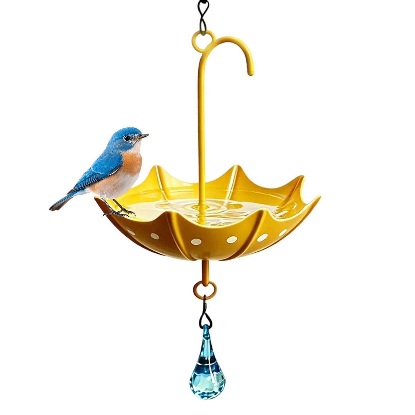 Oiseau bleu perché sur un abreuvoir parapluie jaune rempli d'eau, avec goutte d'eau décorative en cristal, sur fond blanc laisse