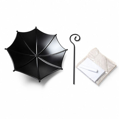 Mangeoire parapluie noire pour oiseaux démontée avec sa tige-crochet et son sachet de visserie, posée sur une table en bois